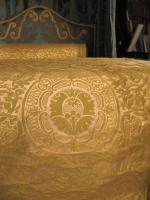 A massive, 19th century, State Bed re-upholstered in a blue, silk damask brocade