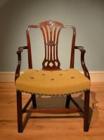 A fine set of George III mahogany dining chairs comprised of 2 armchairs and 8 single chairs.
