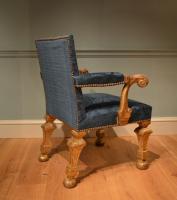 A George II carved giltwood armchair 