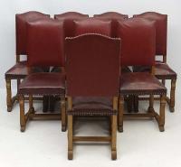 A set of eight Burgundian leather upholstered sidechairs