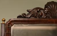  A high quality George II mahogany box toilet mirror having the rare feature of a carved cresting.