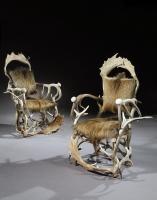 A magnificent pair of late-19th-early-20th century, trophy armchairs