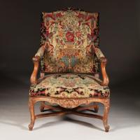 A Fine Pair of Early 19th Century French Walnut Fauteuils
