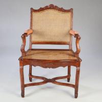 A Pair of Walnut Caned Bergeres
