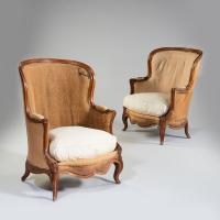 An Overscale Pair of 19th Century Walnut Bergeres