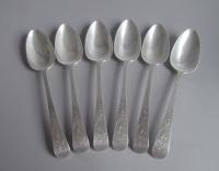 A very fine set of six George III Bright Cut Tablespoons made in London in 1791 by Godbehere & Wigan