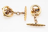 Antique Cufflinks in 14 Karat Gold of a Coiled Serpent with Sapphire Centre, American circa 1890
