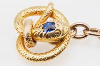 Antique Cufflinks in 14 Karat Gold of a Coiled Serpent with Sapphire Centre, American circa 1890