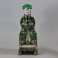 Chinese seated biscuit figure of a court official, Kangxi (1662-1722)