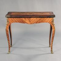 A Fine Pair of Louis XV Style Marquetry Inlaid Card Tables