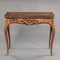 A Fine Pair of Louis XV Style Marquetry Inlaid Card Tables