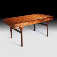 A Mid 20th Century Rosewood Desk by Nanna Ditzel