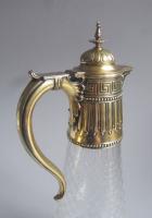 The Royal Silversmith, Robert Garrard. An extremely fine and very unusual silver gilt mounted Wine Jug made in London in 1877 by Robert Garrard