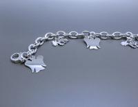 A Sterling Silver Bracelet With Charms