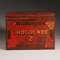 A 19th Century Red Tole Chocolate Tin