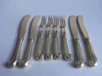 A Fine Set of Silver Gilt Dessert Knives and Forks made in London in 1873 by Francis Higgins