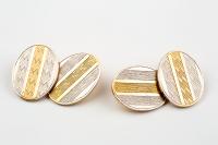 Two Colour 18 Carat Gold Oval Shaped Antique Cufflinks, English circa 1910