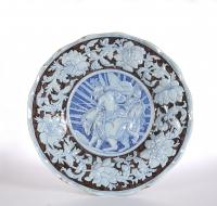 A Large Pavia Faience Charger