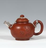 A Small Silver-Mounted Dutch Redware Teapot