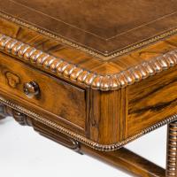 A late Regency rosewood free standing library table by James Winter