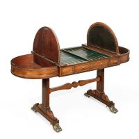 A Regency rosewood games table attributed to Gillows