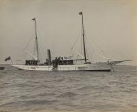 A gelatin print of a beautiful gentleman steam yacht at anchor by W Kirk