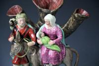 Staffordshire pottery figure group of the Flight to Egypt by Walton, Early 19th century