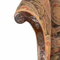 A late Victorian oversized arm chair in the Chippendale manner