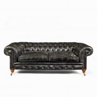 A pair of Victorian three seater walnut chesterfield sofas