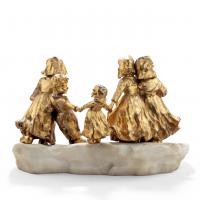 A charming gilt bronze group of Dutch children by Foste