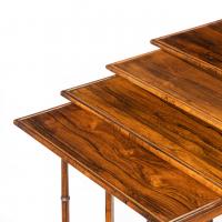 An attractive nest of Regency rosewood quartetto tables