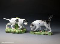 Antique Staffordshire pearlware pottery pair of figures of pointer and setter sporting dogs