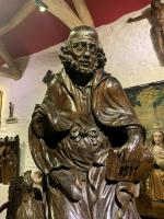 A WONDERFULL AND RARE LATE 15TH CENTURY OAK SCULPTURE OF "THE DENIAL OF ST PETER". CIRCA 1480-1500.