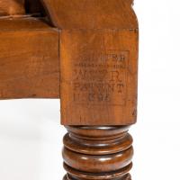 A pair of William IV adjustable mahogany library armchairs, by George Minter