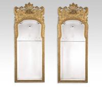 A pair of George l style victorian giltwood mirrors