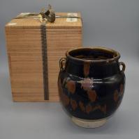 A Henan Russet-Splashed Black-Glazed Twin-Handled Jar