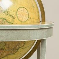 A pair of 21′ contemporary library floor-standing globes