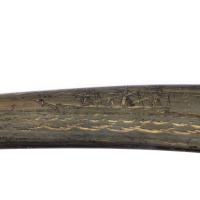 A rare scrimshaw decorated horn