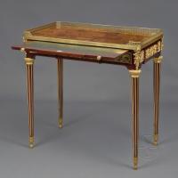 A Louis XVI Style Mahogany and Marquetry Writing Table After The Model by Jean-Henri Riesener