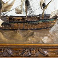 A silver and wood model of HMS Victory by H Wylie
