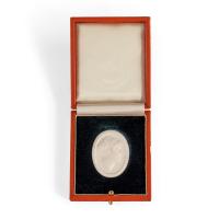 A white vitreous paste cameo of Emma, Lady Hamilton, attributed to William Tassie