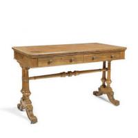 An early Victorian rosewood writing table by Holland & Sons