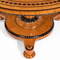 Early Victorian amboyna centre table by Taprell and Holland & Sons