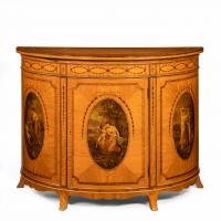 A fine Victorian Sheraton revival West Indian satinwood demi lune commode