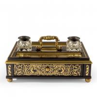 A Regency brass-inlaid ebony desk compendium