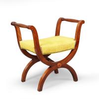 A pair of mahogany X frame stools