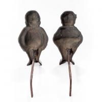 A Pair of cast iron andirons
