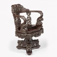 A Meiji period carved hardwood desk and chair