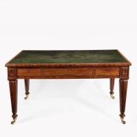 A Regency well-figured mahogany writing table