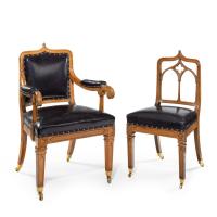 A set of six Gothic oak dining chairs